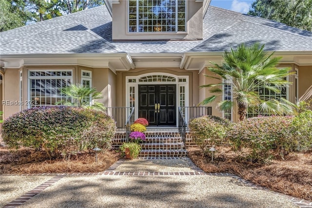 property entrance featuring french doors