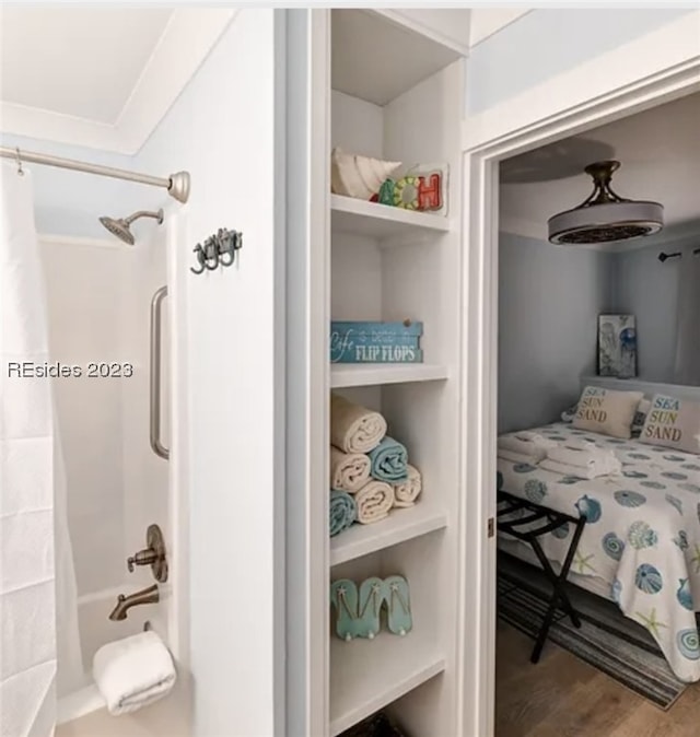 bedroom with hardwood / wood-style flooring