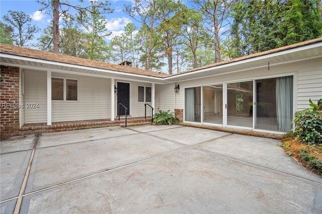 back of house featuring a patio area