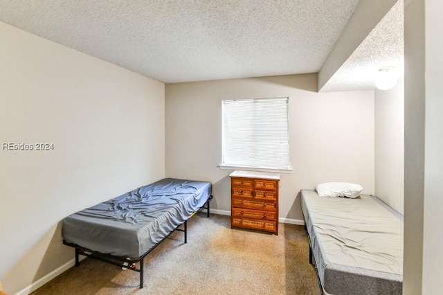 bedroom featuring a textured ceiling