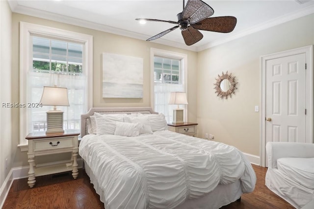 bedroom featuring ceiling fan, ornamental molding, and dark hardwood / wood-style flooring