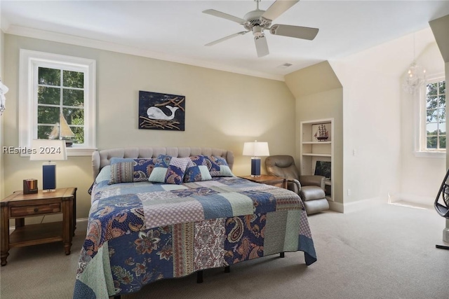 bedroom with crown molding, carpet floors, and ceiling fan