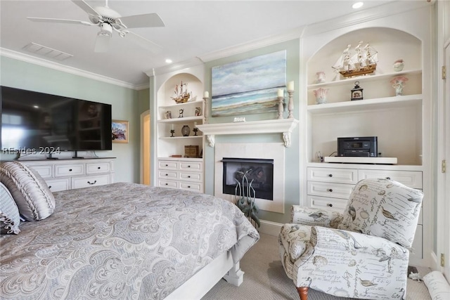 bedroom with ceiling fan and ornamental molding