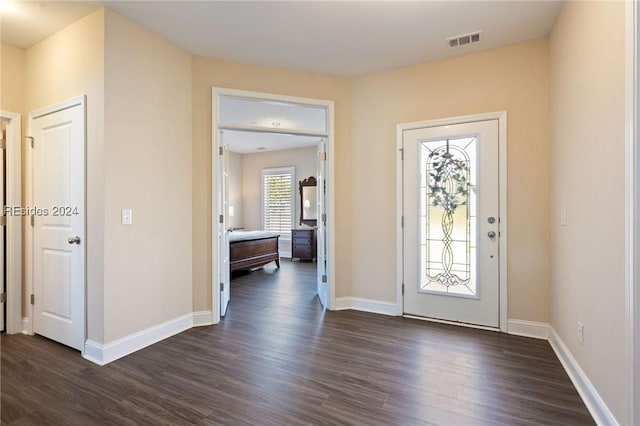 foyer featuring dark hardwood / wood-style floors