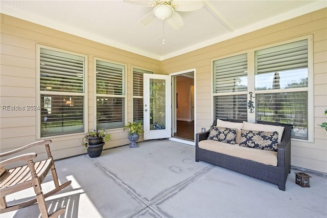 view of patio featuring an outdoor hangout area and ceiling fan