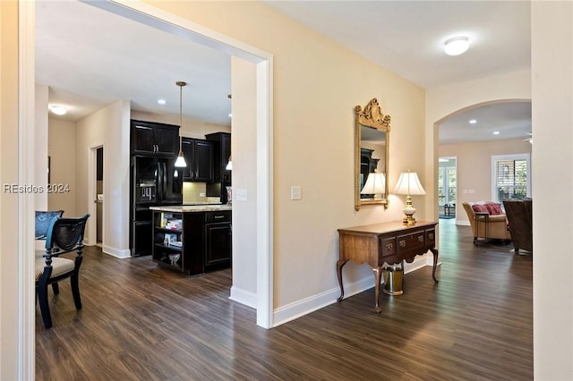 hall with dark wood-type flooring