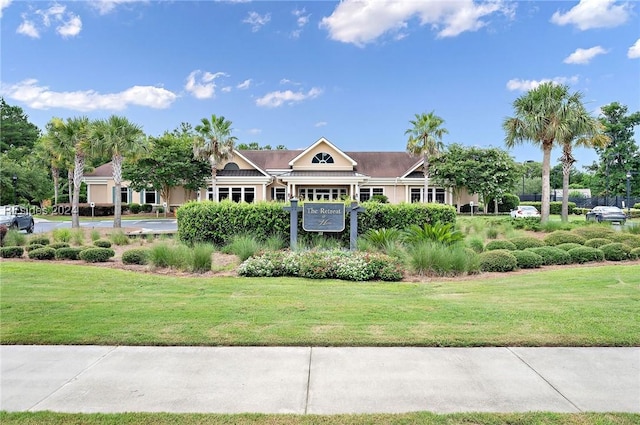 view of community featuring a lawn