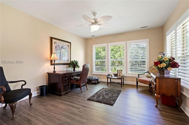 office with ceiling fan and dark hardwood / wood-style flooring