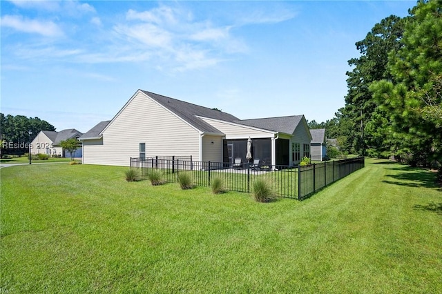 back of house featuring a lawn