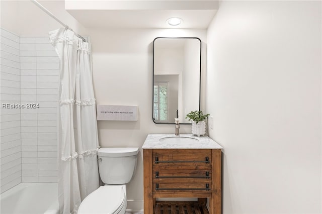 full bathroom with vanity, shower / bath combination with curtain, and toilet