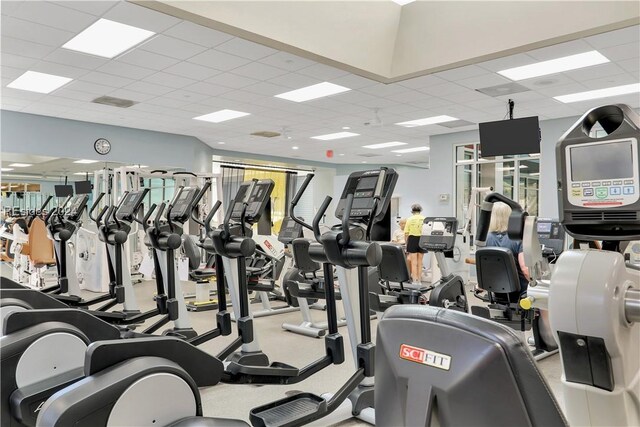 workout area featuring a paneled ceiling