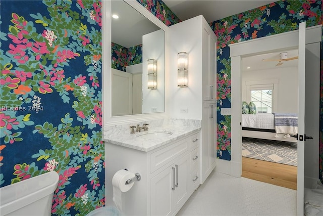 bathroom with vanity and toilet