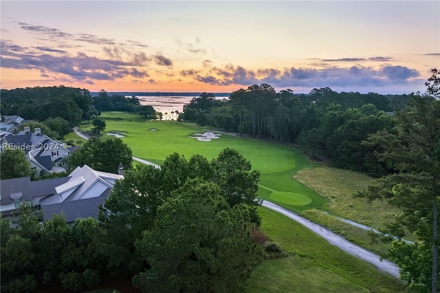 aerial view at dusk with a water view