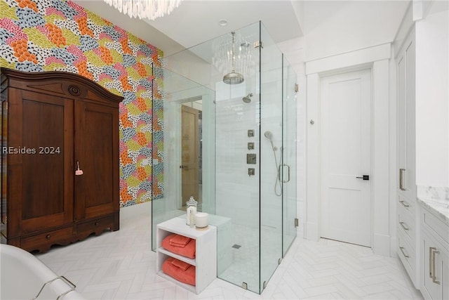 bathroom with vanity and an enclosed shower