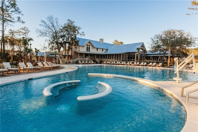 view of swimming pool featuring a patio