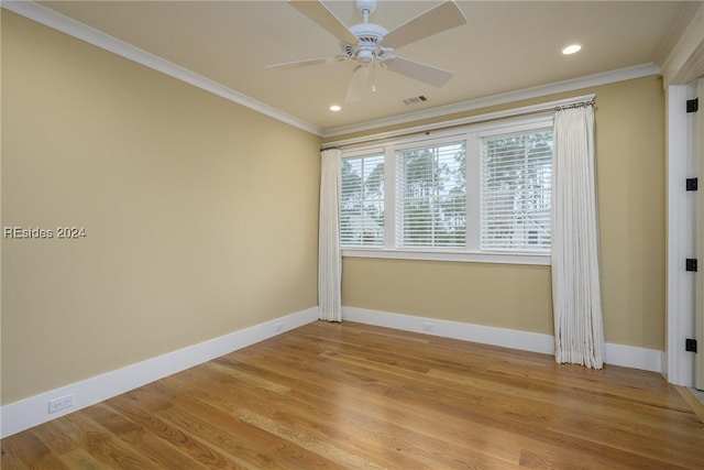 unfurnished room with crown molding, ceiling fan, and light wood-type flooring