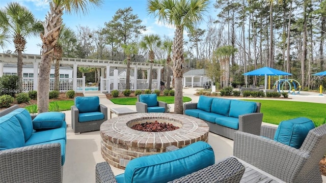 view of patio featuring an outdoor living space and a pergola