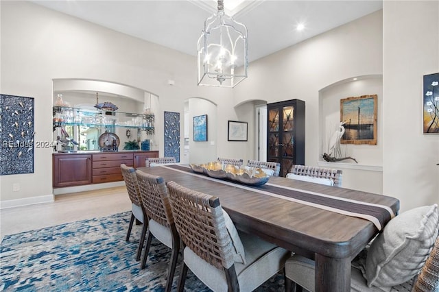 dining room featuring a notable chandelier