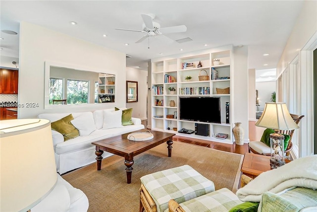 living room featuring ceiling fan