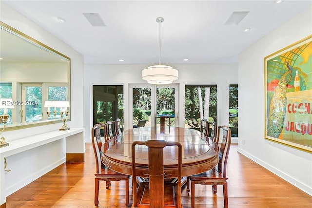 dining room featuring light wood-type flooring