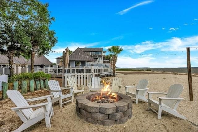 view of patio with a fire pit