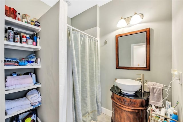 bathroom featuring vanity and walk in shower