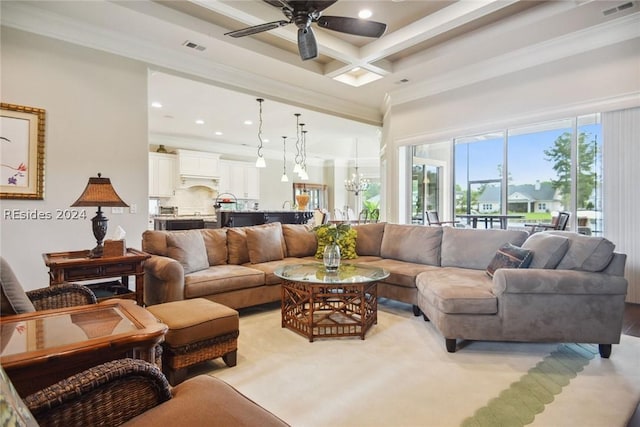 living room with beamed ceiling, ornamental molding, and coffered ceiling