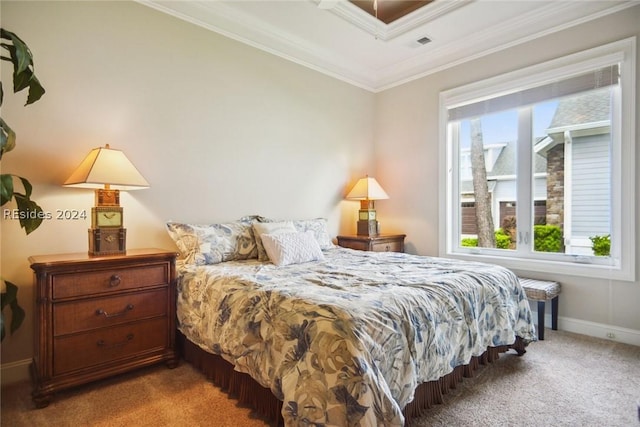 bedroom featuring crown molding and carpet floors