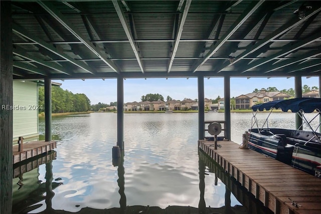 view of dock with a water view