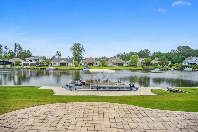 view of dock featuring a water view and a lawn