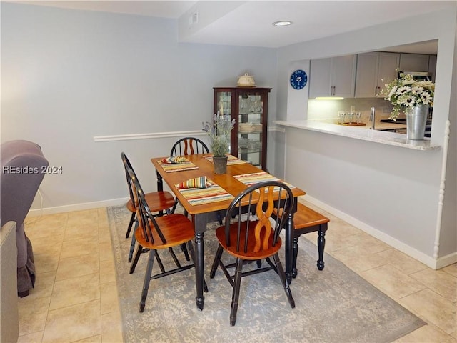 view of tiled dining space