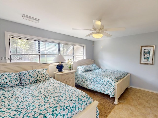 bedroom featuring ceiling fan