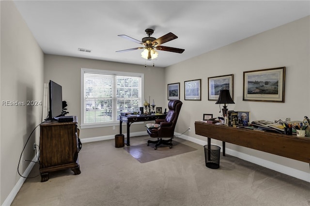 office featuring light colored carpet and ceiling fan