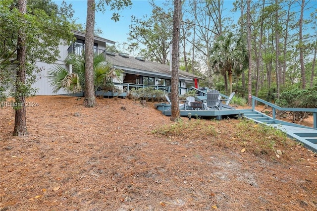 view of yard featuring a deck