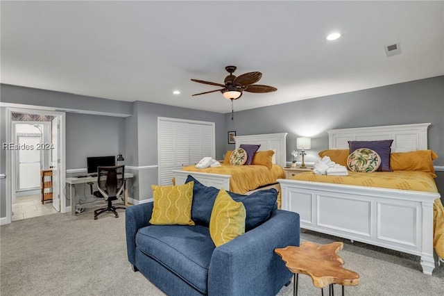 carpeted bedroom featuring ceiling fan