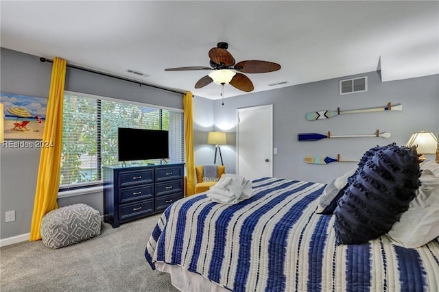 bedroom with light colored carpet and ceiling fan