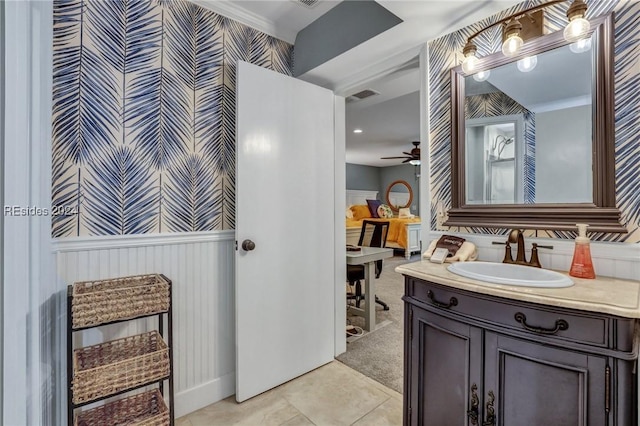 bathroom featuring vanity, tile patterned floors, and ceiling fan