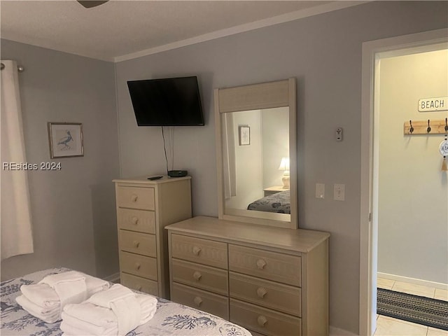 bedroom featuring light tile patterned floors