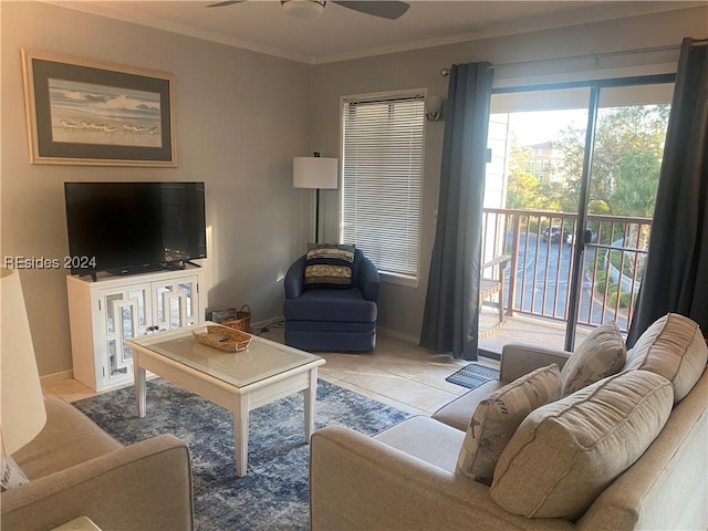 tiled living room with crown molding, ceiling fan, and plenty of natural light