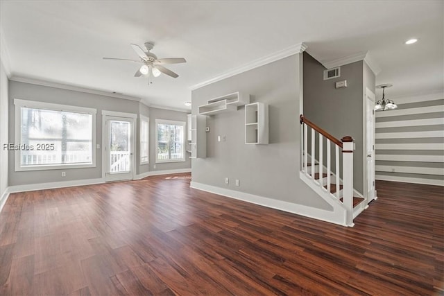 unfurnished living room featuring ornamental molding, dark hardwood / wood-style flooring, and ceiling fan with notable chandelier