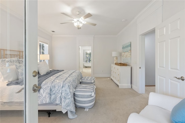 bedroom featuring crown molding, light colored carpet, and ceiling fan