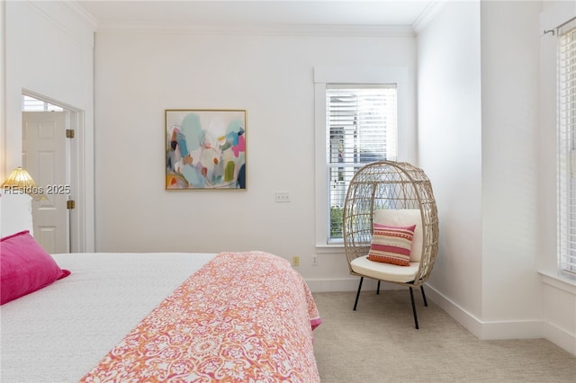 carpeted bedroom with multiple windows and crown molding