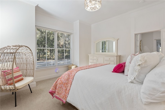 carpeted bedroom featuring crown molding