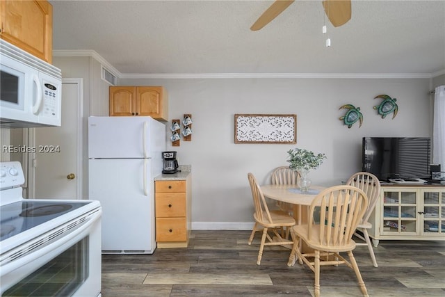 kitchen with crown molding, light brown cabinetry, white appliances, and dark hardwood / wood-style flooring