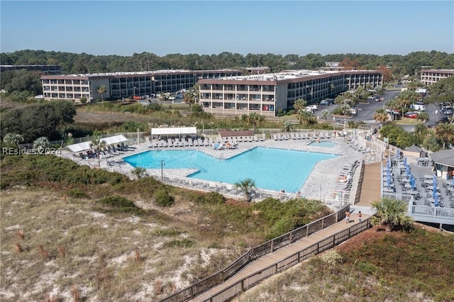 view of swimming pool with a patio