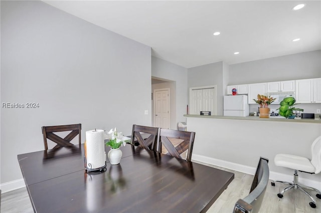 dining room featuring light hardwood / wood-style flooring