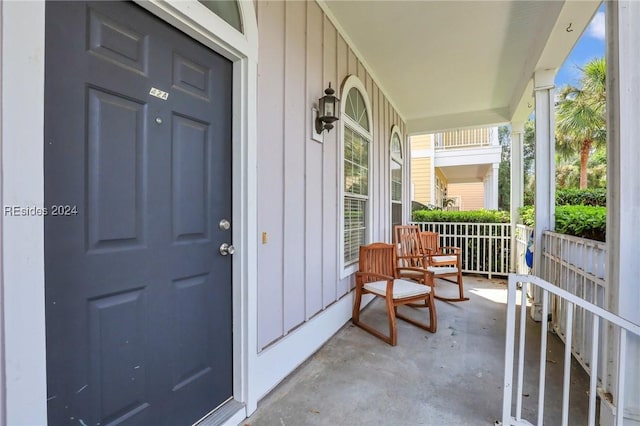 doorway to property with a porch