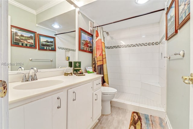 bathroom with vanity, toilet, crown molding, tile patterned floors, and a shower with curtain