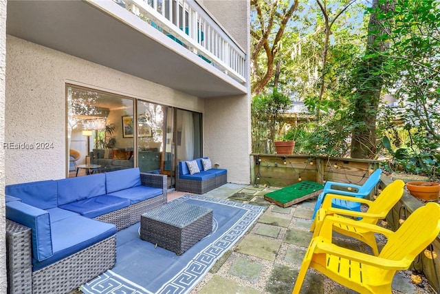 view of patio / terrace featuring a balcony and an outdoor hangout area