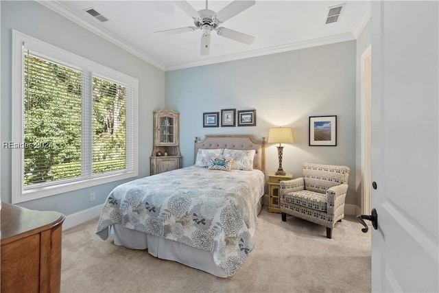 carpeted bedroom with multiple windows, ornamental molding, and ceiling fan